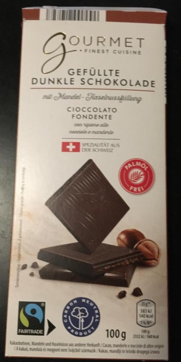 Fotografie - Gefüllte dunkle schokolade mit Mandel-Haselnussfüllung Gourmet