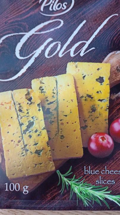 Fotografie - Gold blue cheese slices Pilos