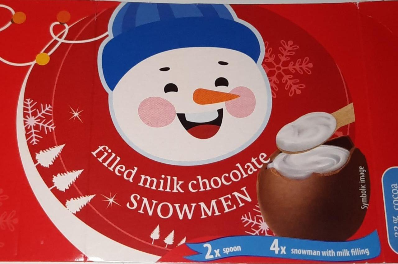 Fotografie - Filled milk chocolate snowmen passio