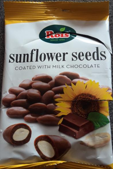 Fotografie - sunflower seeds coated with milk chocolate Rois