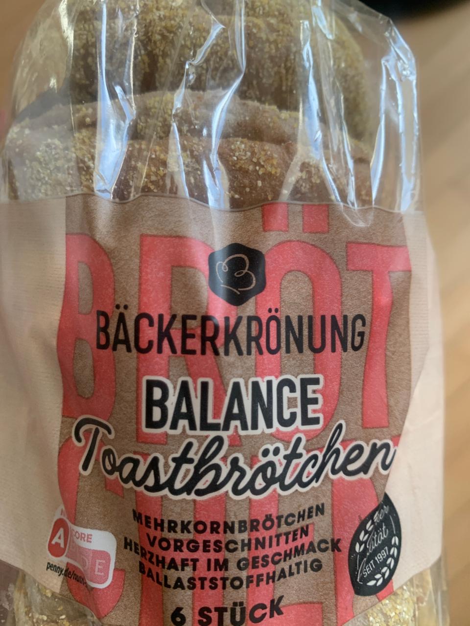 Fotografie - Toastbrötchen Balance Bäckerkrönung