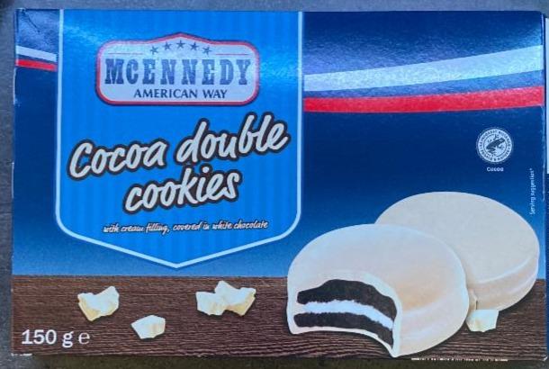 Fotografie - Cocoa double cookies with cream filling, covered in white chocolate McEnnedy American Way