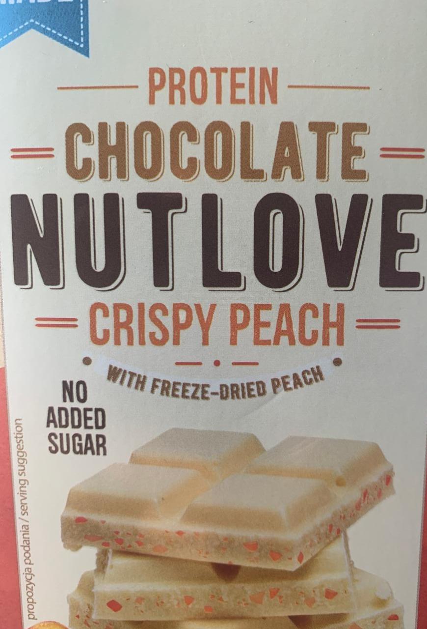 Fotografie - Protein chocolate Nutlove Crispy peach with freeze-dried peach Allnutrition