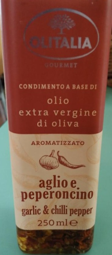 Fotografie - Condimento a base di olio extra vergine di oliva aglio e peperonncino garlic & chilli pepper Olitalia