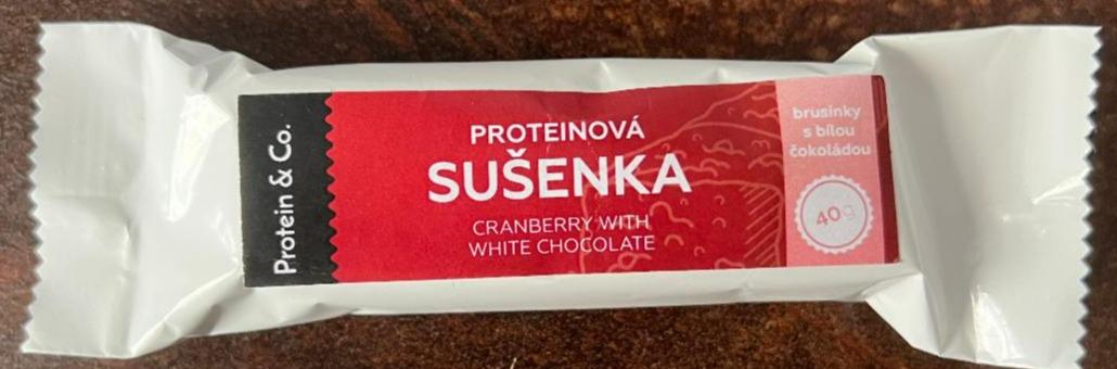 Fotografie - Proteinová tyčinka cranberry with white chocolate Protein & Co.
