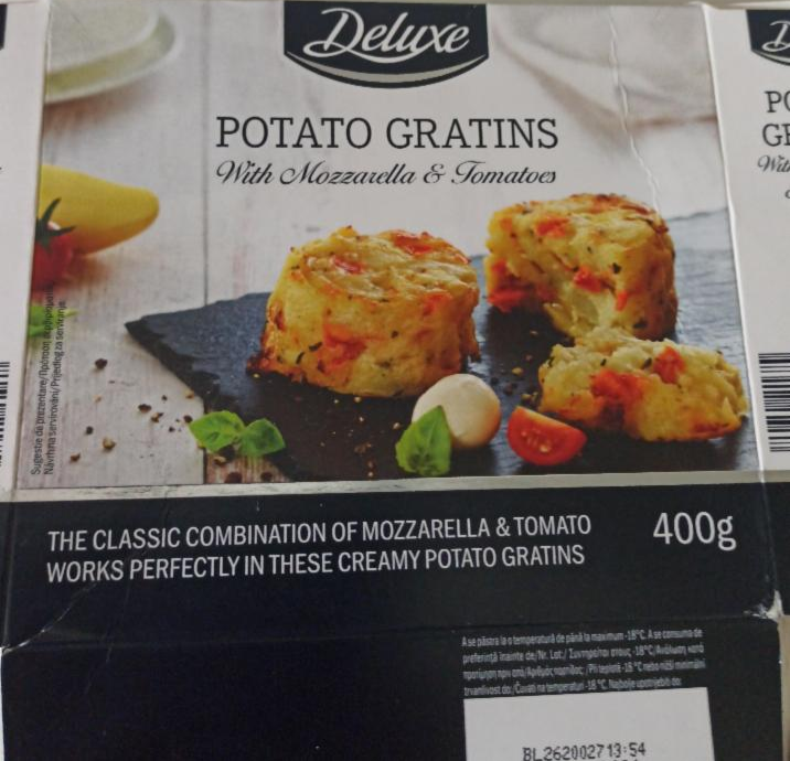 Fotografie - Potato gratins with mozzarella and tomatoes Deluxe
