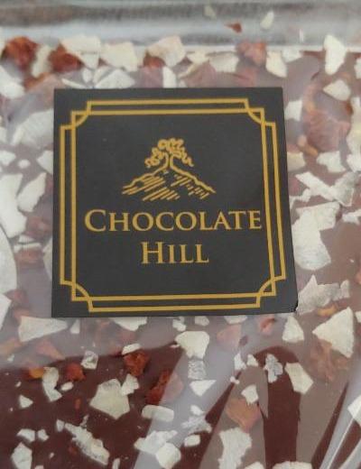 Fotografie - Mléčná čokoláda s kokosem a malinami 52% Chocolate hill