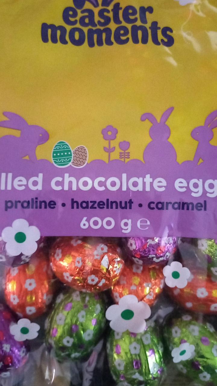 Fotografie - Filled chocolate eggs Praline Hazelnut Caramel Easter Moments