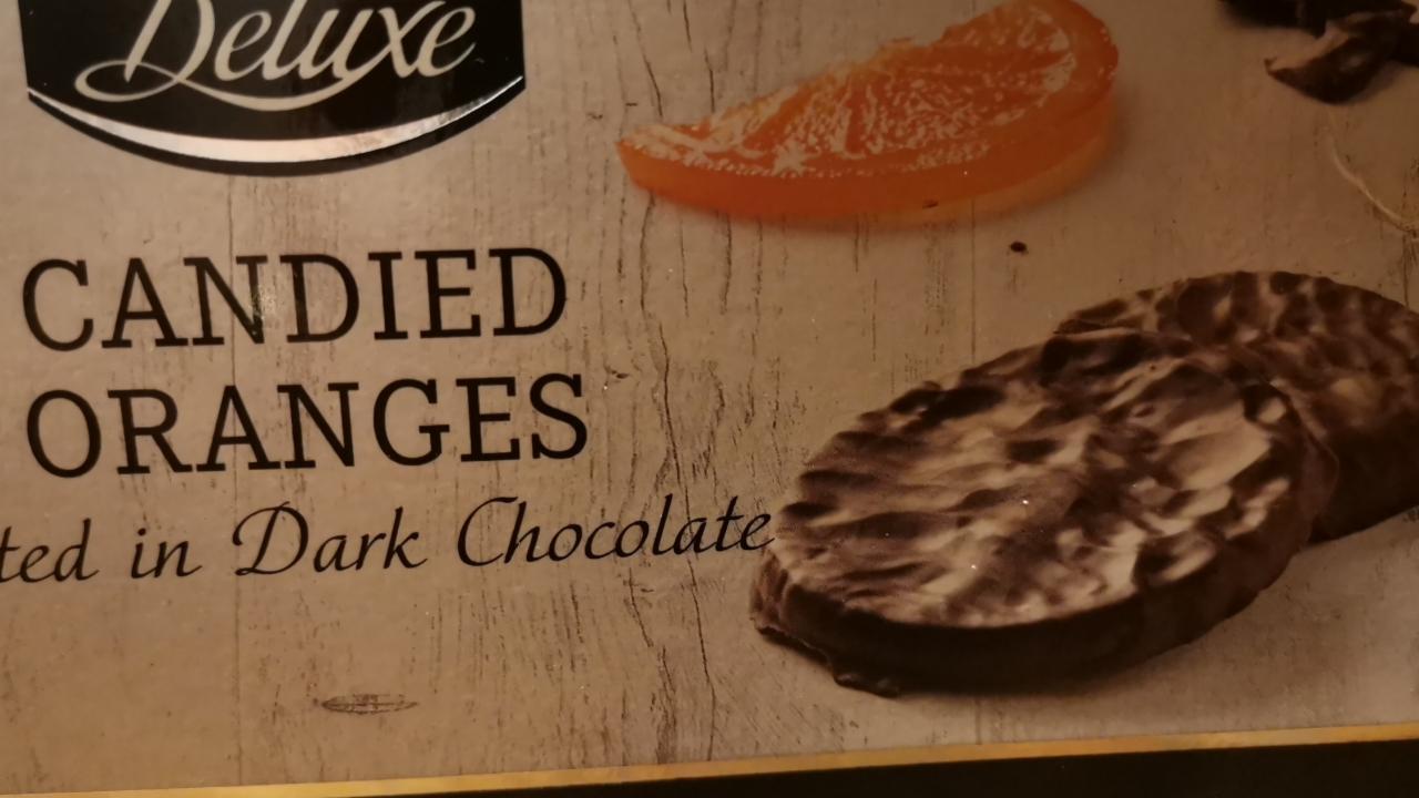 Fotografie - Candied oranges coated in dark chocolate
