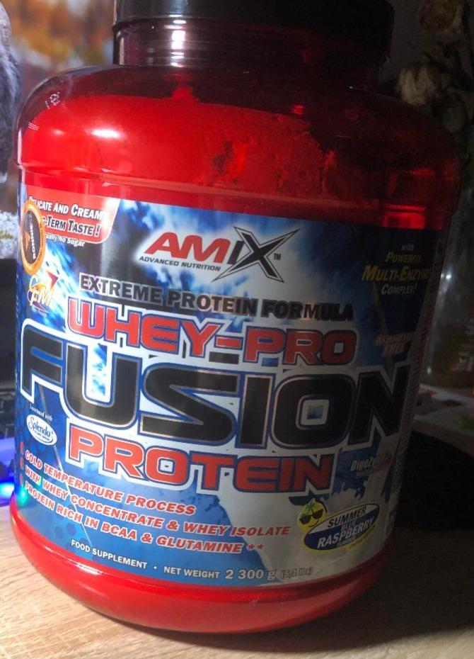 Fotografie - WheyPro Fusion Protein Summer Blue Raspberry Amix Nutrition