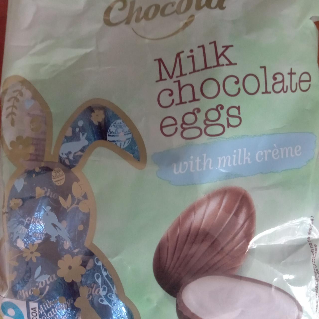 Fotografie - Milk chocolate eggs with milk créme Chocola