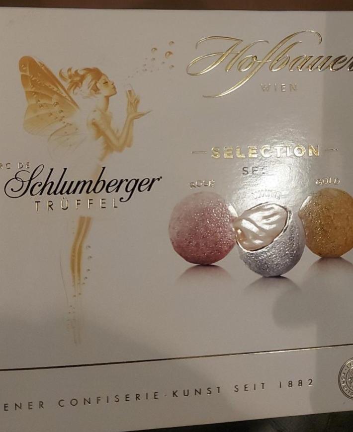 Fotografie - Filled truffles with Marc de Schlumberger pomace brandy in chocolate and milk chocolate Hofbauer