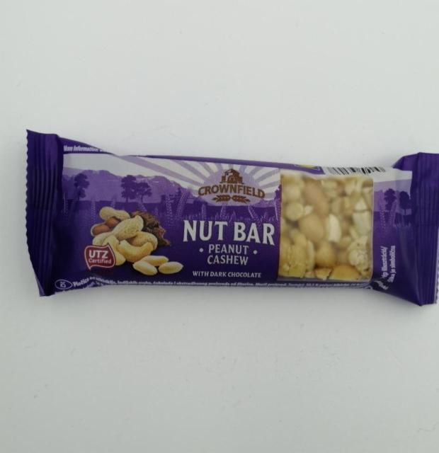 Fotografie - Nut bar peanut cashew with dark chocolate Crownfield