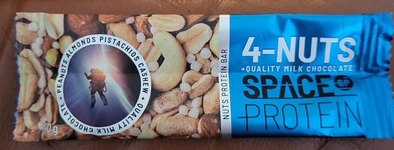 Fotografie - Nuts Protein Bar 4-Nuts Milk Chocolate Space Protein