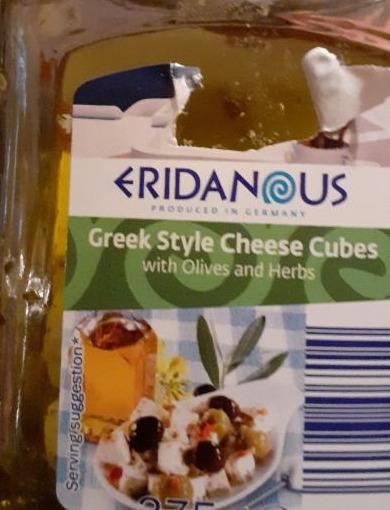 Fotografie - greek style cheese cubes with olives and herbs Eridanous