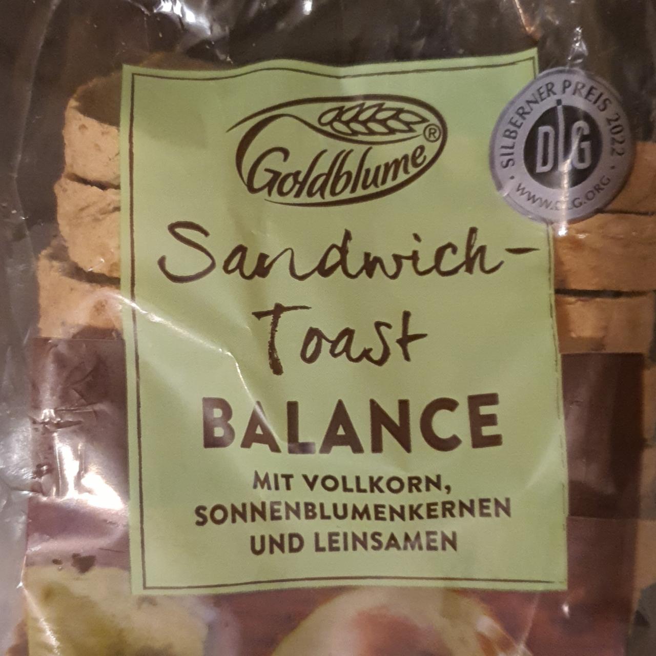 Fotografie - Sandwich-Toast Balance Goldblume