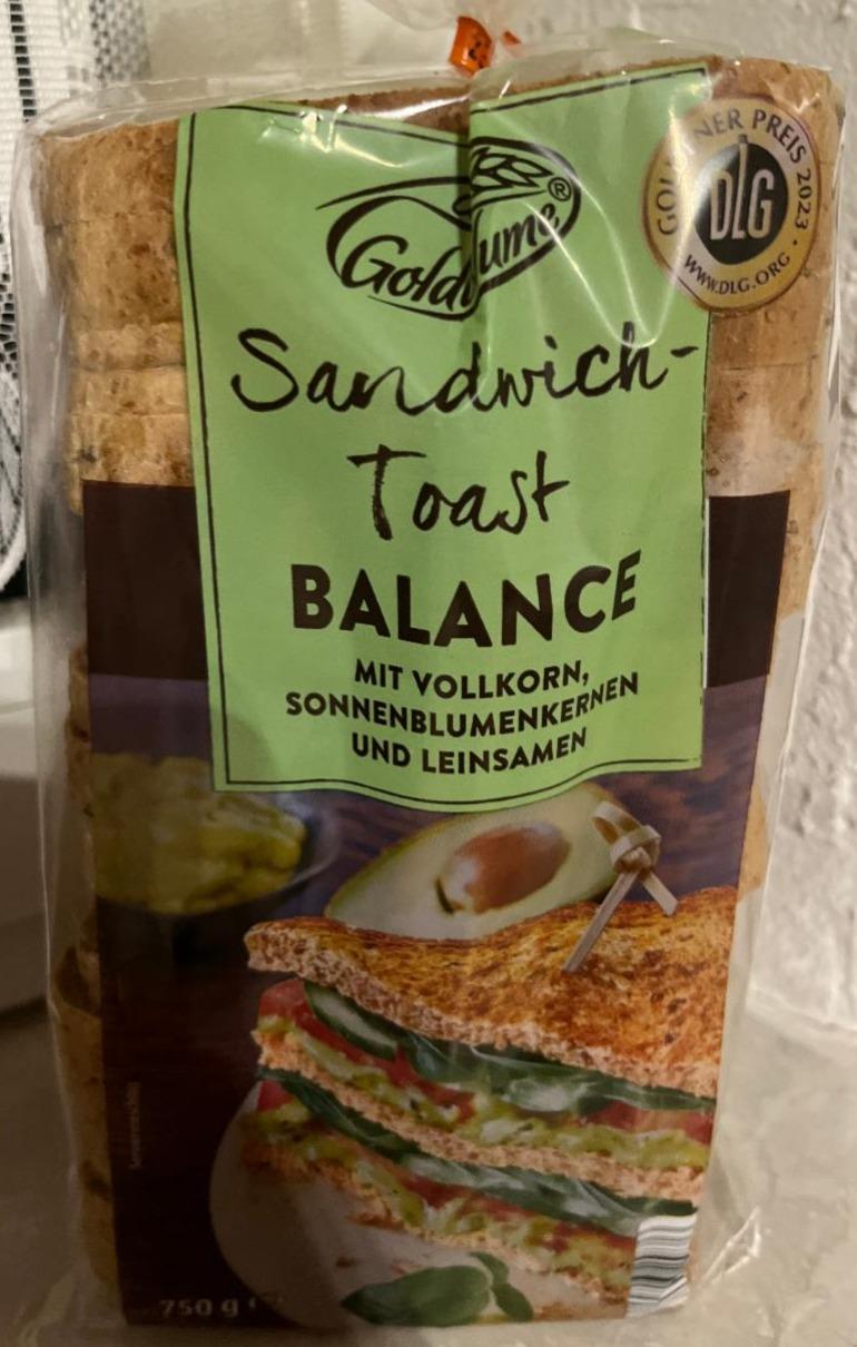 Fotografie - Sandwich-Toast Balance Goldblume