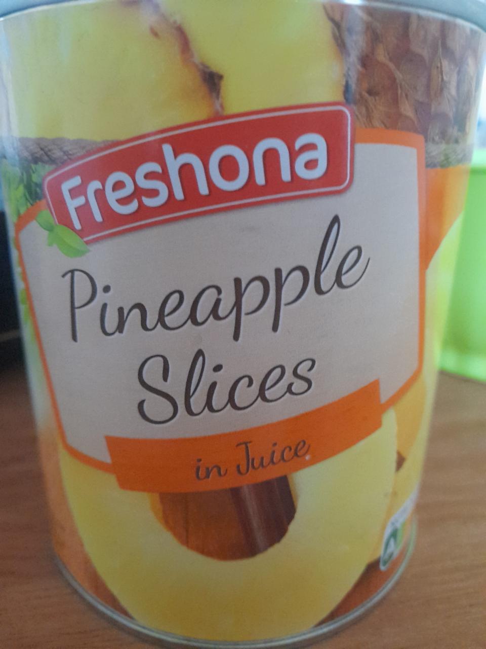 Fotografie - Pineapple slices in juice Freshona