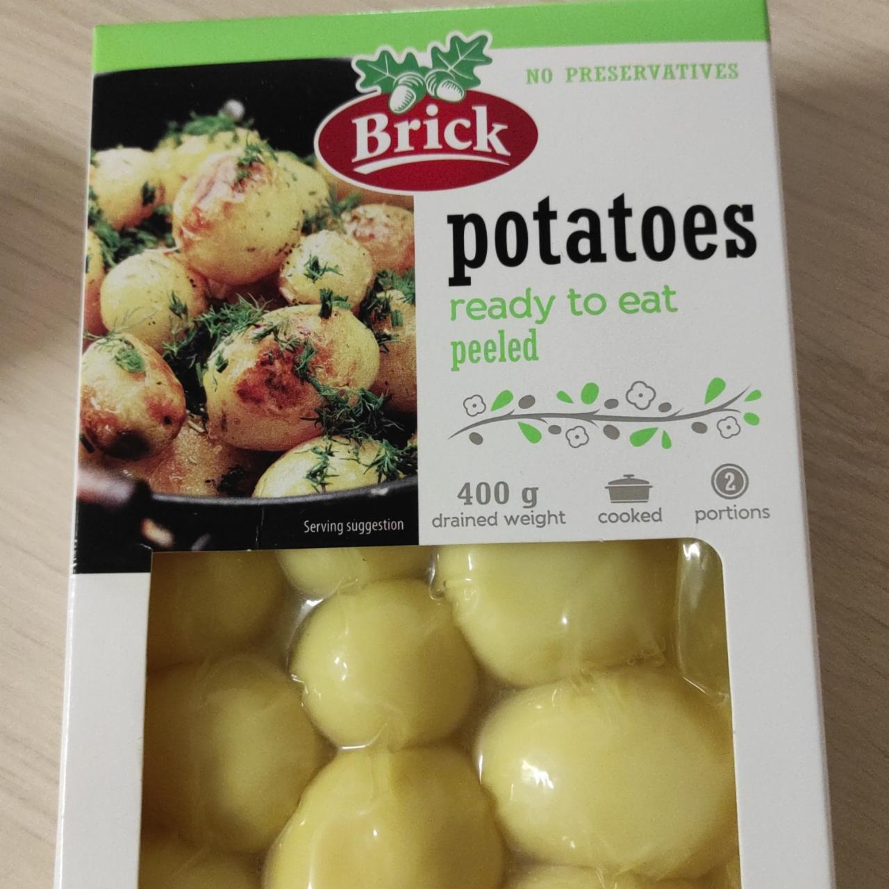 Fotografie - potatoes ready to eat peeled Brick