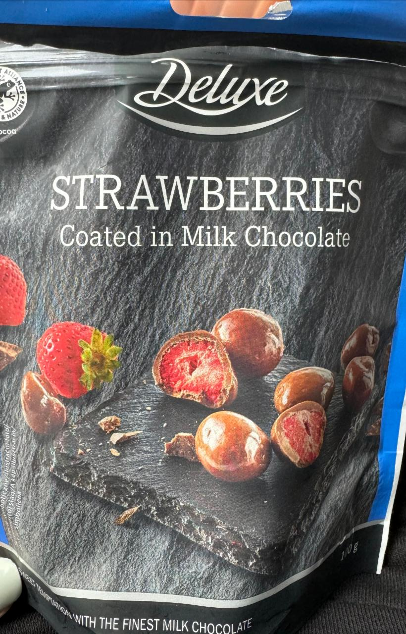 Fotografie - Strawberries coated in milk chocolate Deluxe