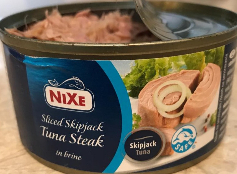 Fotografie - Tuna steak Sliced skipjack in brine Nixe